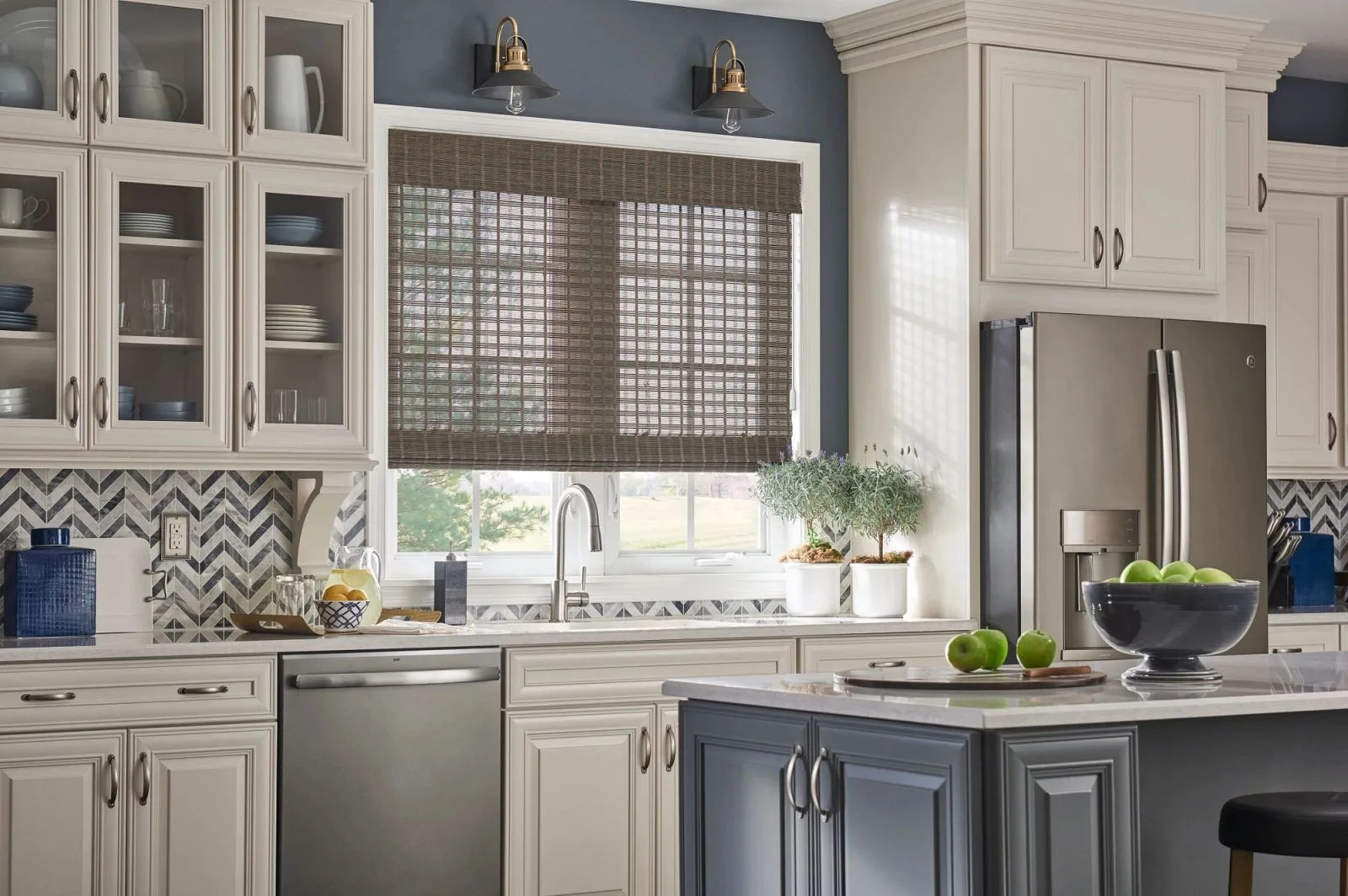 Natural woven shades in kitchen over sink